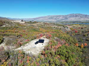 Birds eye view of property with a mountain view