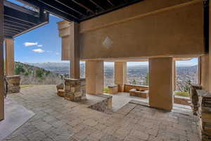 View of patio / terrace with a mountain view