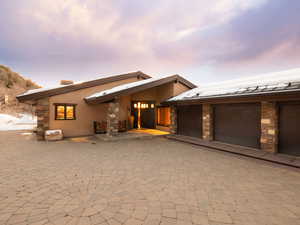 View of front of property with a garage