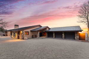 View of front of home with a garage