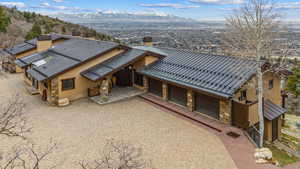 Birds eye view of property with a mountain view