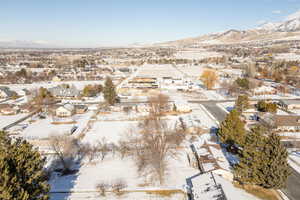 Snowy aerial view with a mountain view