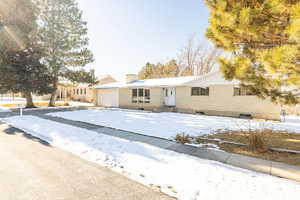 Single story home with a garage