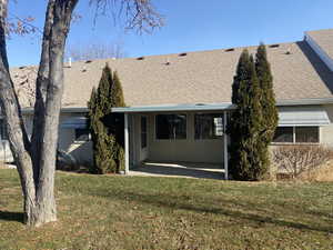 Rear view with covered patio.