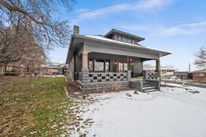 View of front of property with covered porch