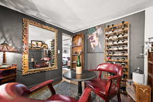 Wine area featuring wood-type flooring