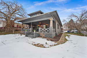 View of front of house featuring covered porch