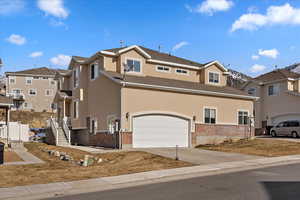 View of front of home with a garage