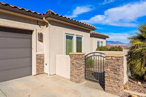 View of exterior entry with a mountain view