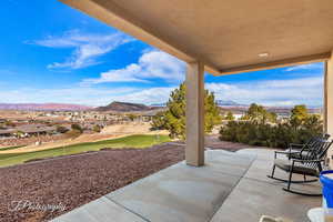 View of patio / terrace with a mountain view