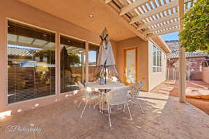 View of patio featuring a pergola