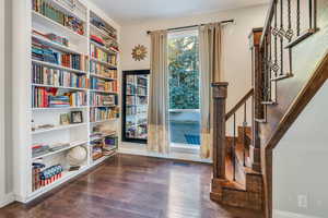 Library area with stairs to upper level