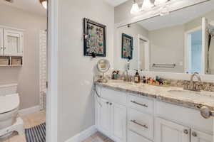 Primary bathroom features double sinks