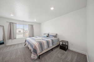 View of carpeted bedroom