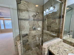 Bathroom with vanity and walk in shower