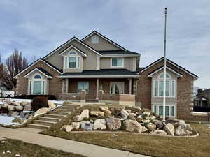 View of property featuring a front yard