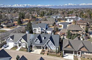 Birds eye view of property with a mountain view