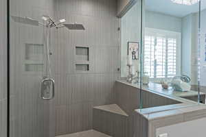 Bathroom featuring walk in shower