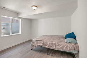 Bedroom featuring light hardwood / wood-style flooring