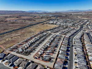 Birds eye view of property with a mountain view