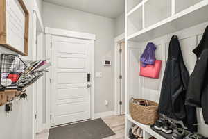 Mudroom featuring light hardwood / wood-style floors