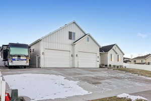 View of front of property with a garage