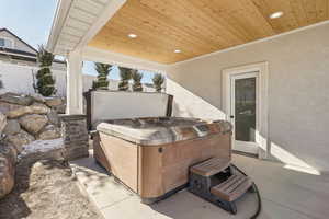 View of patio / terrace featuring a hot tub