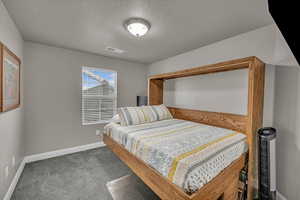 Bedroom with carpet flooring