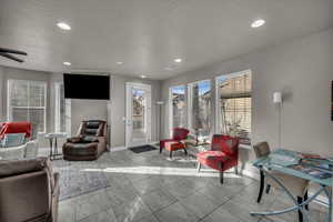 Living room with light tile patterned floors