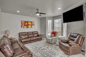 Tiled living room with ceiling fan