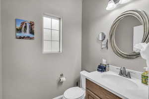 Bathroom featuring toilet and vanity