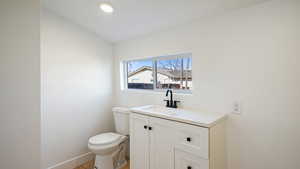 Bathroom with toilet and vanity