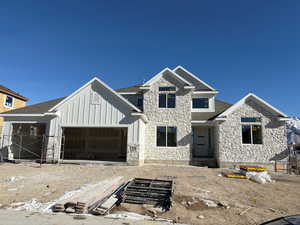 Unfinished property with a garage