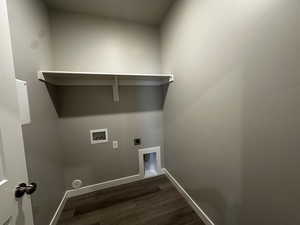 Washroom featuring washer hookup, electric dryer hookup, and dark hardwood / wood-style flooring