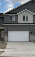 View of front of home featuring a garage