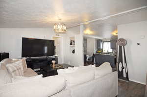 Living room featuring dark wood-type flooring