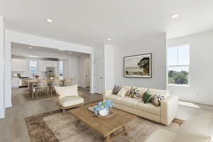 Living room with light wood-type flooring