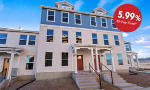 View of front of house with stucco siding