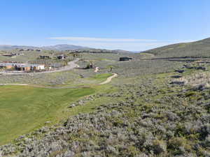 View of mountain backdrop featuring a local golf course