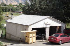 View of outdoor structure with a garage