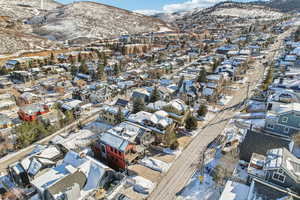 Snowy aerial view with a mountain view