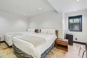 Bedroom with light wood-type flooring