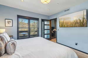 Bedroom featuring light hardwood / wood-style floors