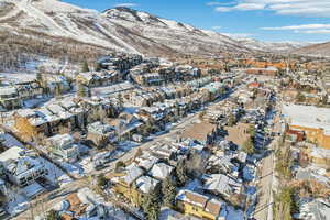 Snowy aerial view with a mountain view