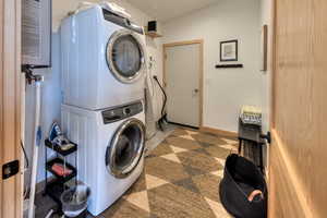 Washroom with stacked washer / dryer