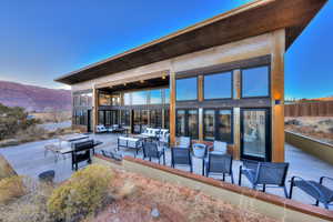 View of patio / terrace featuring a mountain view and an outdoor hangout area