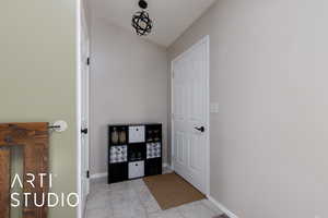 Interior space with light tile patterned floors