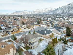 Snowy aerial view with a mountain view