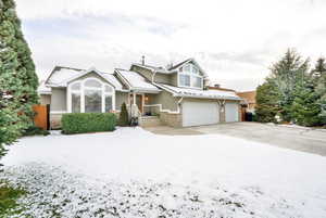 View of front of home featuring a garage