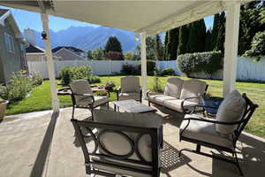 View of patio / terrace with a mountain view and outdoor lounge area